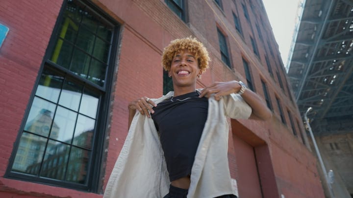 Youthful Confidence Shines Amidst NYC's Urban Landscape