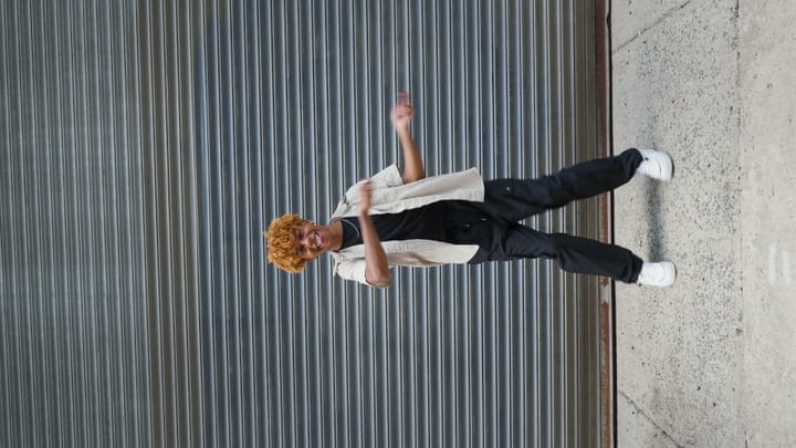 Joyful Dance Moves Against an Urban Backdrop in NYC