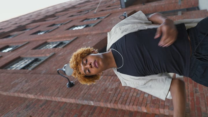 Young Urban Explorer In Stylish NYC Backdrop