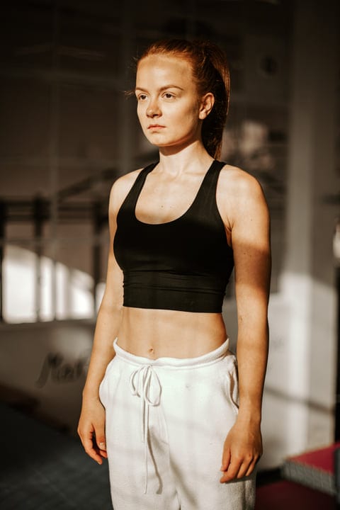 Morning Sun Illuminates Woman Preparing For Parkour Training