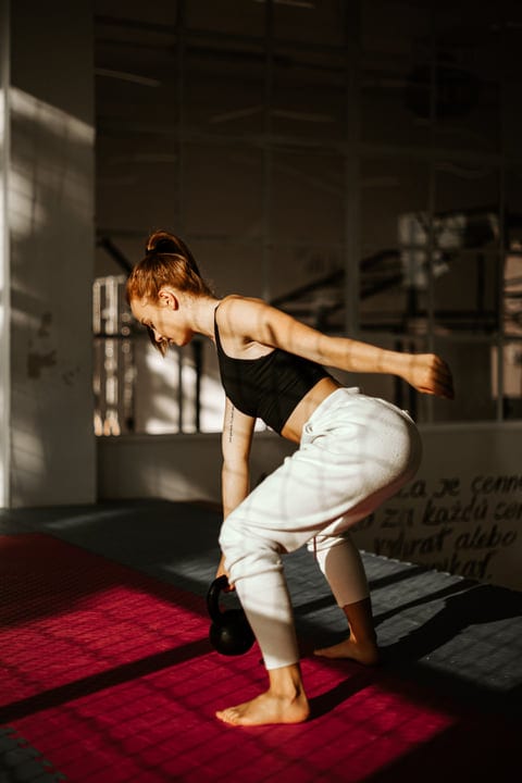 Sunlight Casts Bold Shadows On Parkour Enthusiast's Training