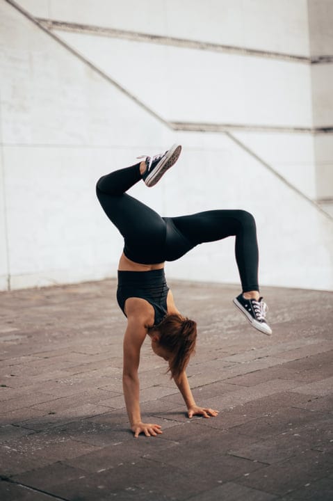 Defying Gravity: Woman Mastering Parkour In Urban Space