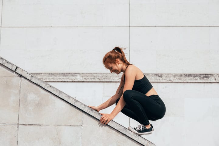 Focused Woman Conquers Urban Obstacles With Precision