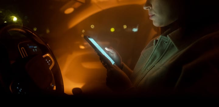 A Businesswoman Navigates the Night With Precision and Focus