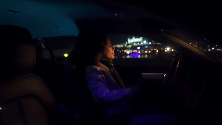 City Lights Reflecting On Her Ambitious Night Drive