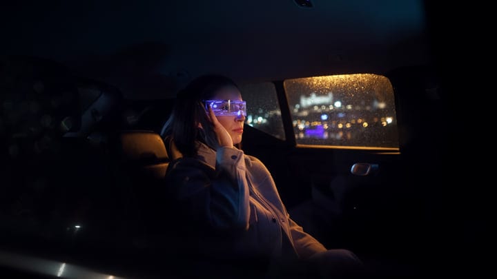 A Businesswoman Navigates the Night With Futuristic Glasses