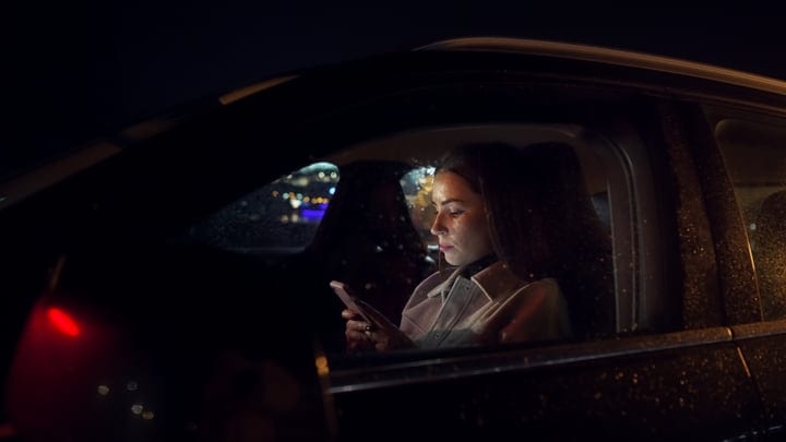 Late Night Reflections In A Businesswoman's Drive Home