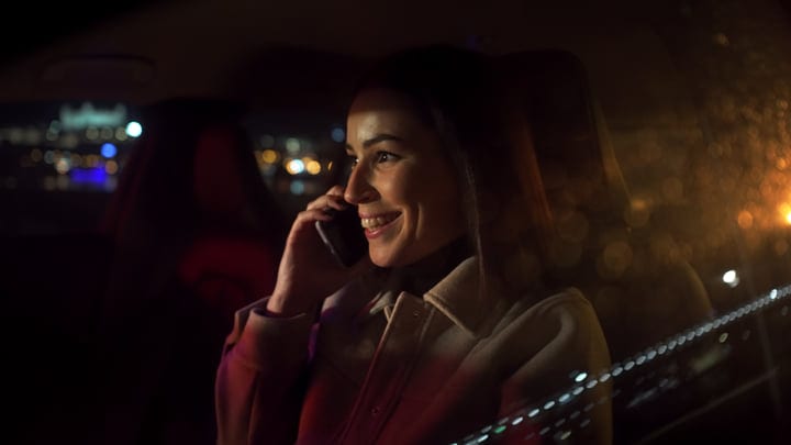 Businesswoman Embraces Night Drive With Confidence and Purpose