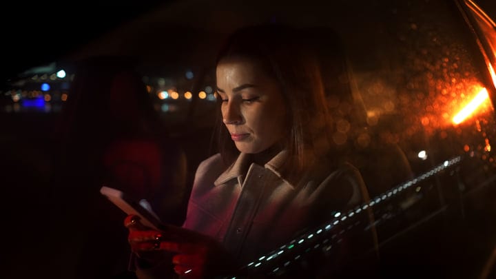 Businesswoman Navigates A Night Drive With Determination