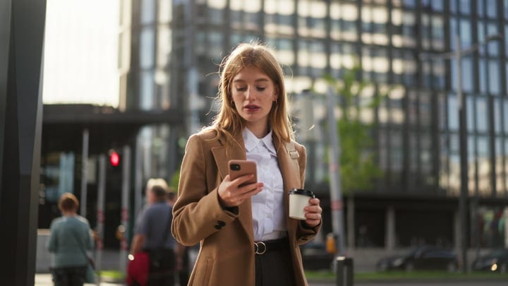 Businesswoman Balances Coffee And Communication In Vienna