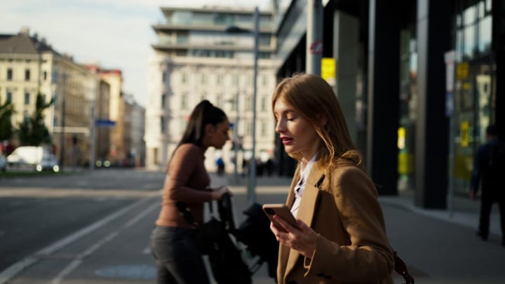 Businesswoman Navigates Her Day In Vienna's Urban Pulse