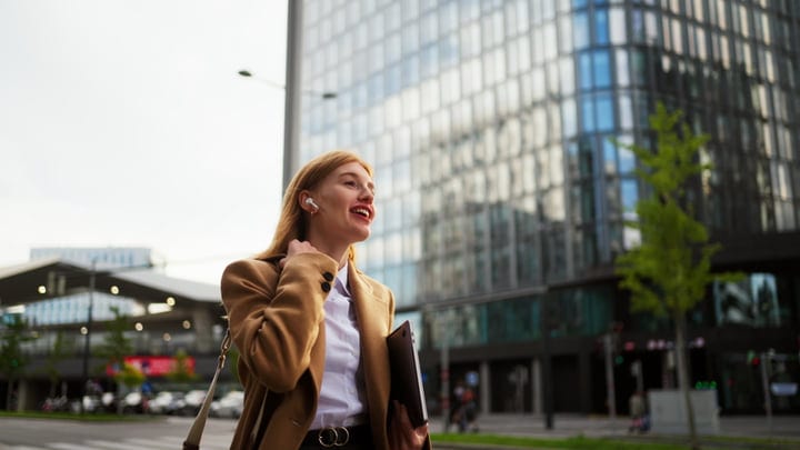 Confident Businesswoman Walking Through Vienna's Urban Streets