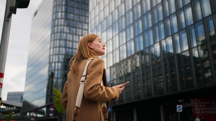 Modern Businesswoman Navigates Vienna's Urban Jungle