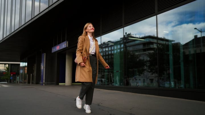 Confident Steps Through Vienna's Modern Streetscape