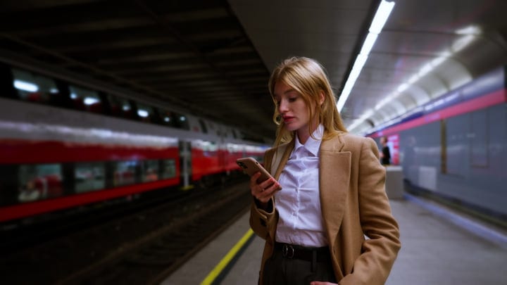 Businesswoman Navigating Vienna Train Station With Confidence