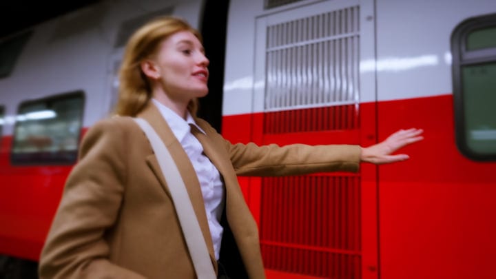 Dynamic Businesswoman Catches A Train in Vienna