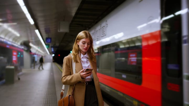 Modern Professional Navigates Her Day Through Vienna Subway