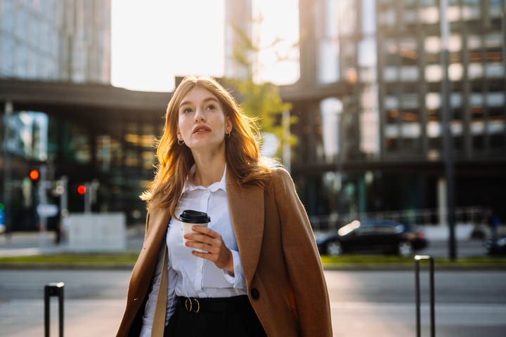 Morning Ambitions: Businesswoman With Coffee In Vienna