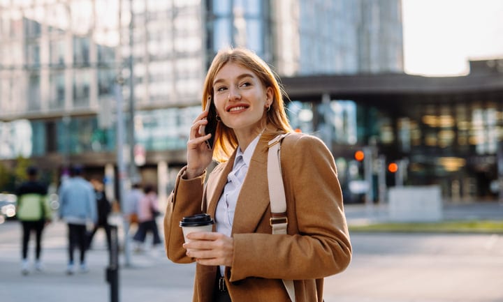 Confident Businesswoman Enjoying Coffee Break In Vienna