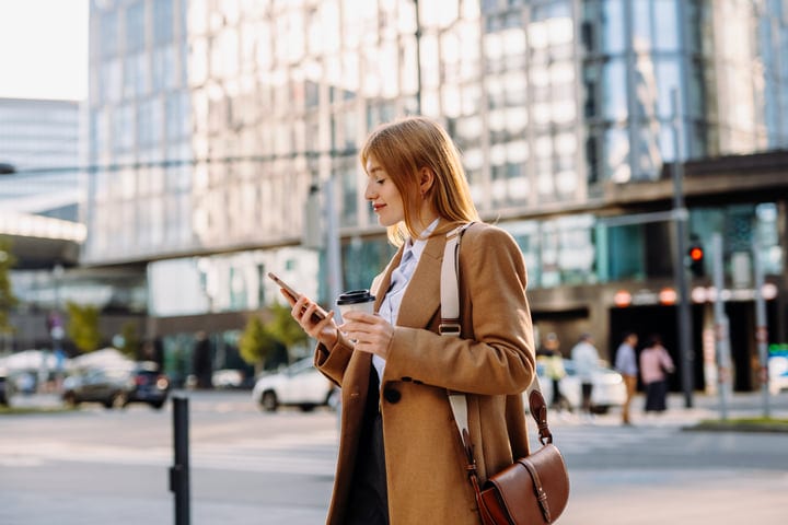 Confident Professional Navigating Her Day In Vienna Streets