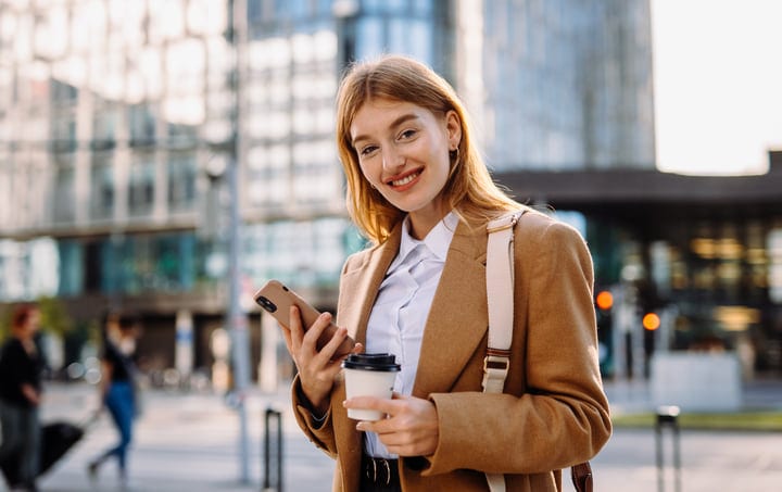 Confident Businesswoman Enjoying Coffee In Vienna's Morning Light