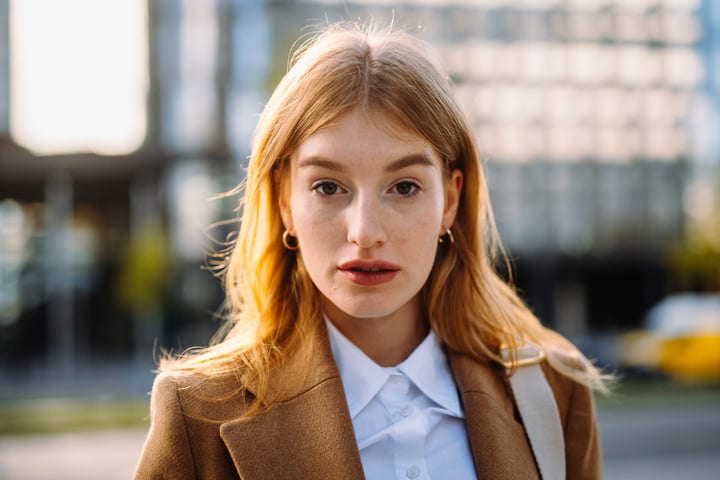 Confident Businesswoman Embraces Morning Light In Vienna