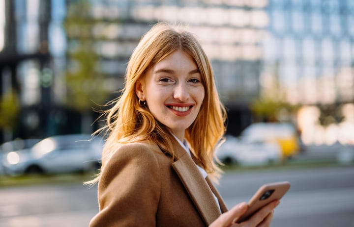 Confident Businesswoman Enjoys Vienna's Autumn Light