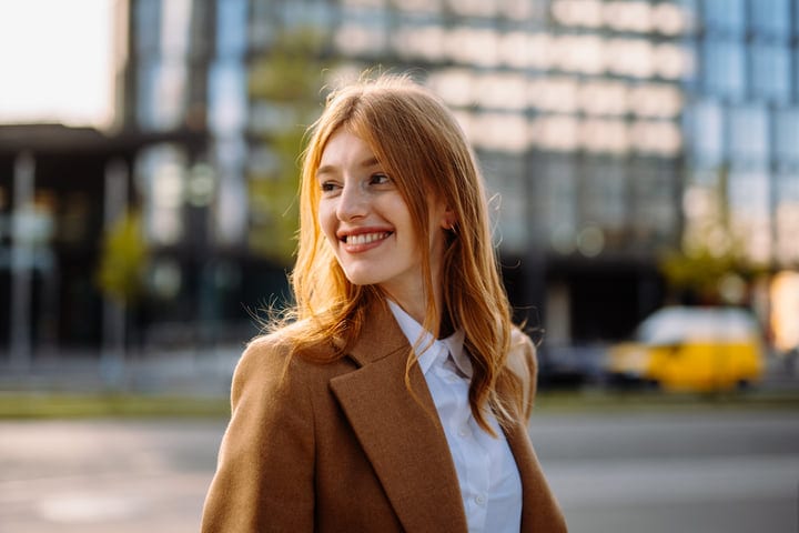 A Vibrant Businesswoman Embracing Vienna's Urban Energy