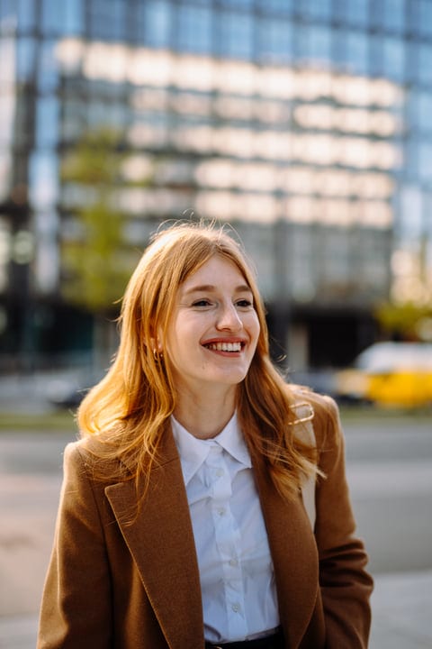 Smiling Businesswoman Enjoys A Sunny Vienna Day