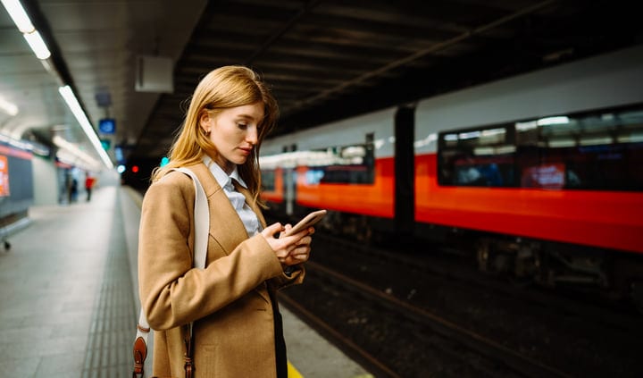 Businesswoman Navigates Vienna Subway With Focused Intensity