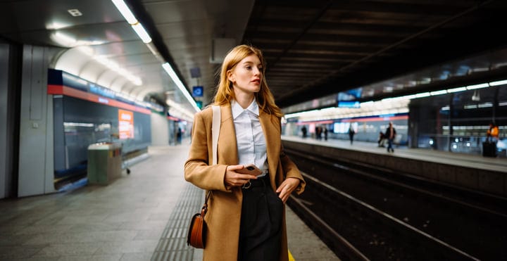 Confident Businesswoman Navigates Vienna Subway Platform