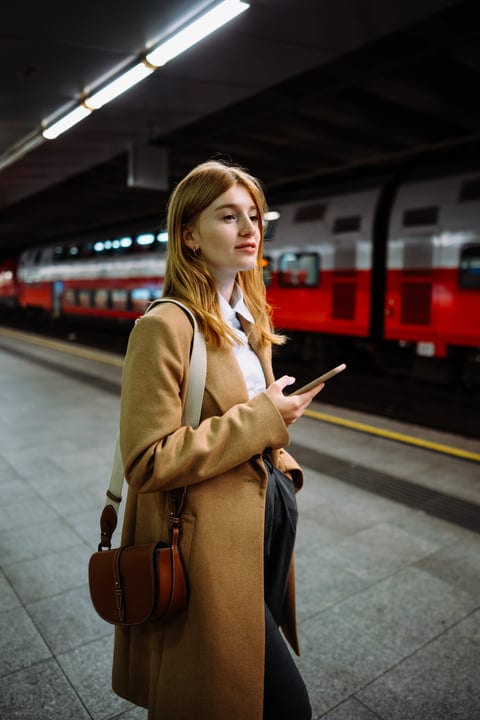 Focused Businesswoman Navigating Vienna Underground With Confidence