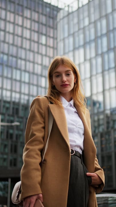 Confident Businesswoman Embraces Urban Elegance In Vienna