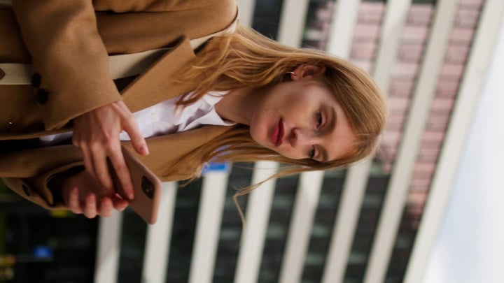 Businesswoman Engages With Her Tablet In A Vienna Cafe