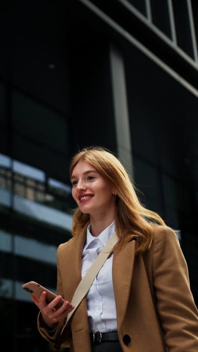 Confident Businesswoman Enjoys A Stroll Through Vienna Streets