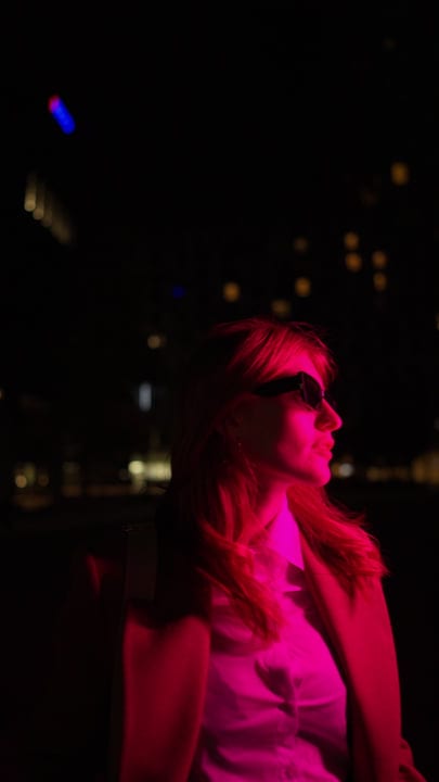 A Businesswoman Sees Vienna's Night Through Neon Hues