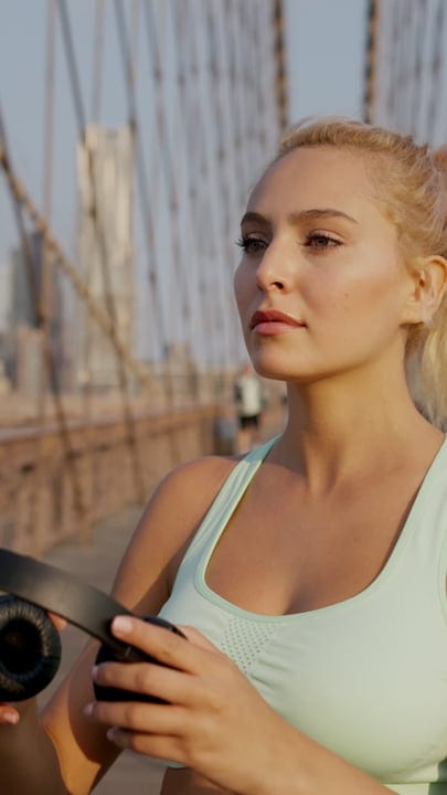 Focused Runner Prepares For A Morning Bridge Workout