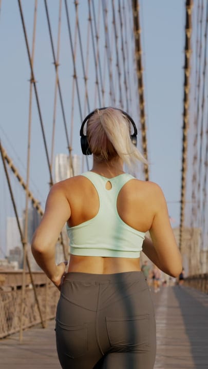 Morning Jogger Embraces the Energy of City Life