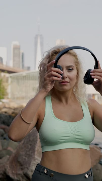 Urban Fitness Enthusiast Prepares For Outdoor Workout