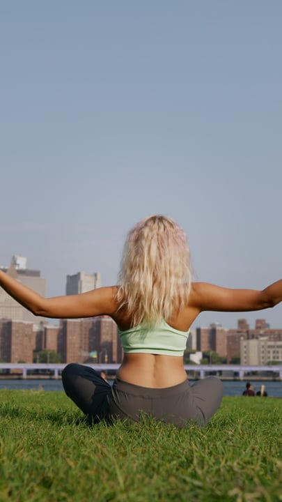 Embracing Serenity With Open Arms In The City Park