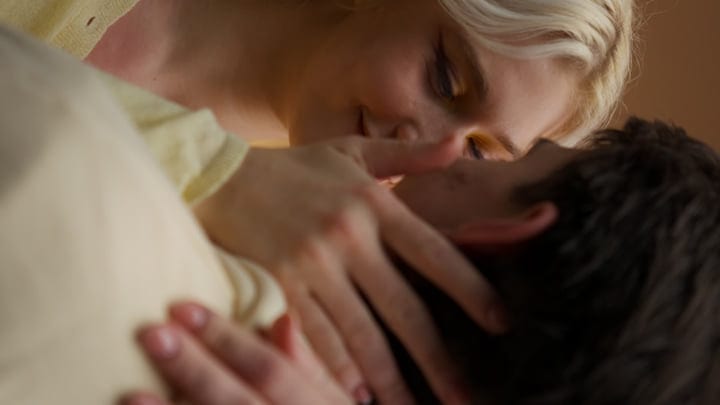 Tender Moments Shared In A Softly Lit Studio Embrace
