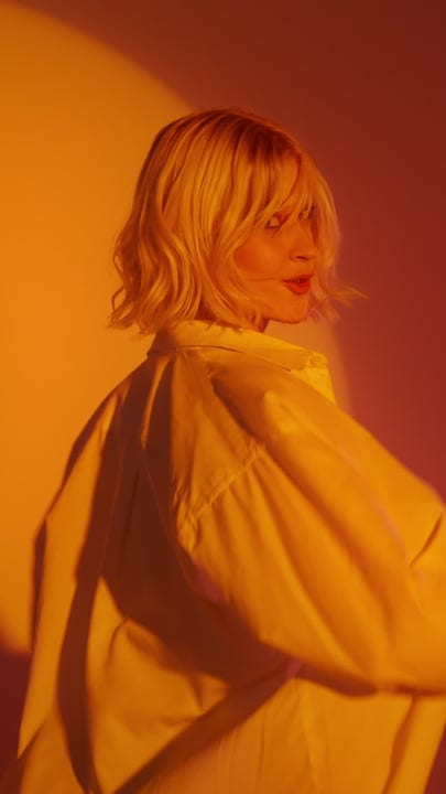 Warm Hues Embrace a Gen Z Portrait in Motion