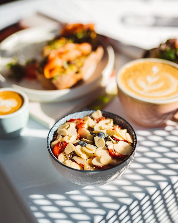 Sunlit Breakfast Bowl With Fresh Fruit And Almonds