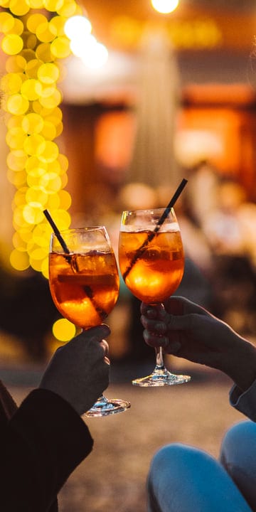 A Toast to Evening Elegance Under Warm Lights
