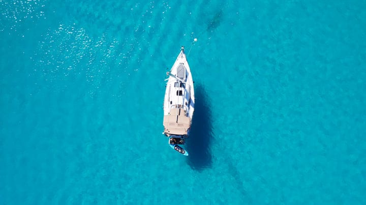 Sailing Adventure Captured From Above In Azure Waters