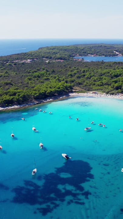 Aerial View Of Boats Anchored In Turquoise Waters