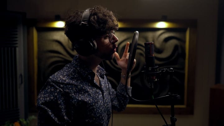 Passionate Musician Engages in Studio Recording Session