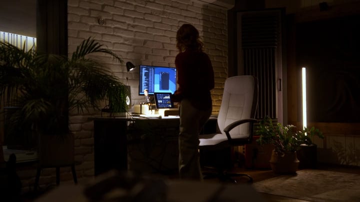 Creative Professional Engaged in Late-Night Studio Work