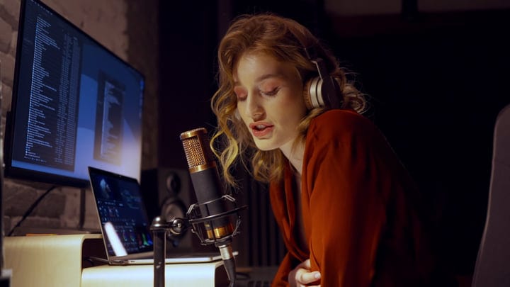 A Passionate Vocalist Immersed In Studio Creativity