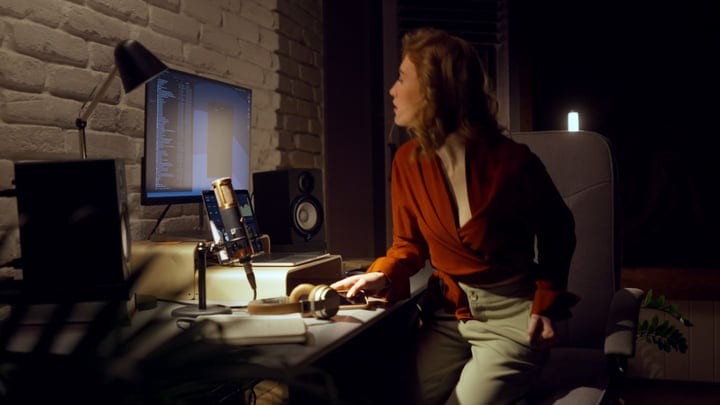 Creative Producer Immersed In A Late-Night Studio Session